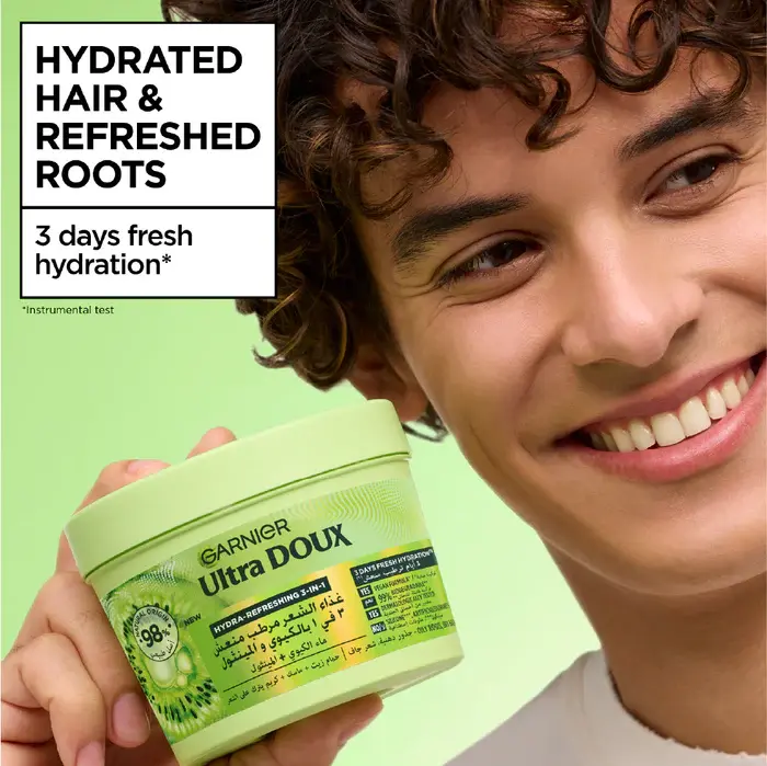 4-dmi_garnier_ecom_haircare_ultra_doux_hairfood_kiwi_atf_enhanced_results_mena_03112025.webp
